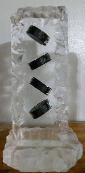 Individual Table Centerpiece with Hockey Pucks frozen into block