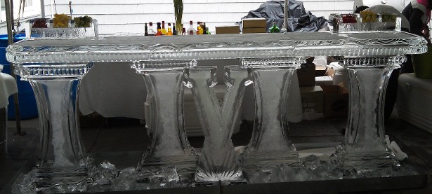 10 foot bar with carved letter 