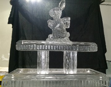 16.)  Ice Matters Two Tier Tray with Carved Bunny Topper