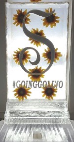 Snowfilled Initial and hash tag with sunflowers frozen into block