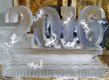 Year Carved with Salimanders frozen onto block