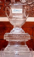 Mory's Laminated Logo frozen into block, trophy silhoette