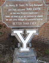 Snowfilled logo, wording, horizontal cut corner on base with Snowfilled and carved around Yale Logo