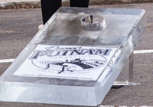 Laminated Logo frozen into block of corn hole game