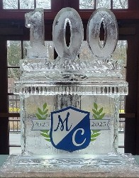 Large base with printed/laminated logo frozen into the block and a Carved 100 on top