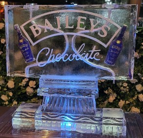 Snowfilled Bailey's Logo with Bottles frozen into block of double pour drink luge