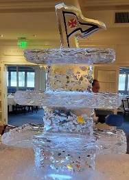 Ice Matters - shells frozen into support legs of three tier tray with colored burgee on top