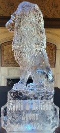 Ice Matters Carved Lion on Raised Base with Snowfilled Plaque in front