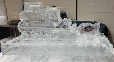 ice matters - bulldozer on back of 40 inch tray with small laminated logo pushing ice chunks