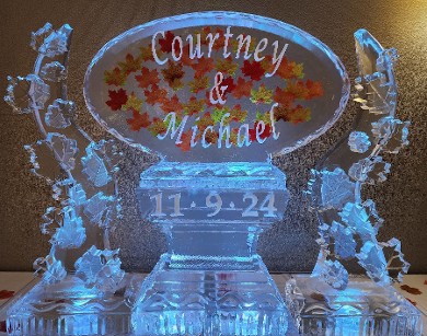 Ice Matters - Snowfilled Horizontal Logo with Silk Leaves Frozen into the ice and an abstract leaf tower on each side