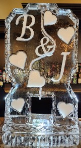 ice matters single pour drink luge with snowfilled initials and hearts