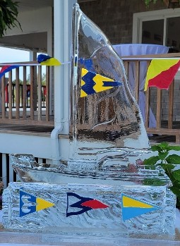 ice matters - sailboat with colored burgee and plaque with three colored burgees