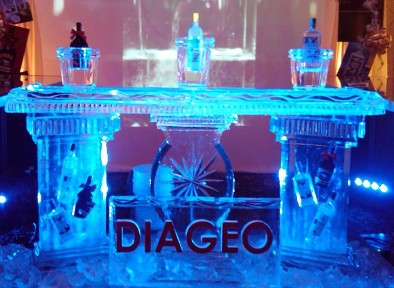 80 Inch Free Standing Bar with Individual Bottle Holders on Top; Bottles frozen into outside legs.  Snowfilled Logo in front.