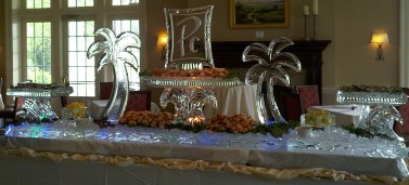 14 foot table top raw bar with logo on raised tray, palm trees and raised side trays