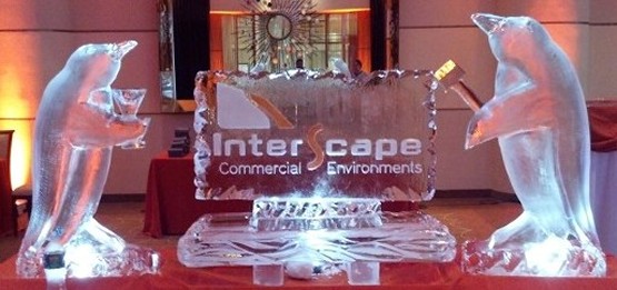 Ice Matters - Logo on back of 40 inch tray with penguin holding drink on one side and penguin holding chisel on other side