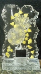Single Pour Drink Luge with Pineapples frozen into block and carved pineapple on front