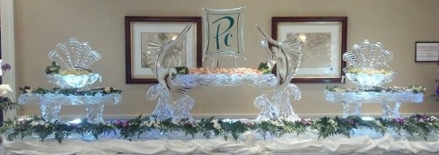 14 foot raw bar with open shells on back of trays, sailfish holding tray with logo